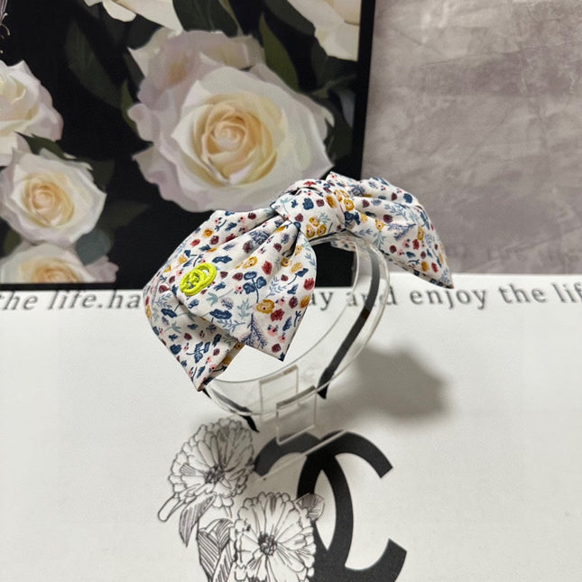 HAIRBAND IN WHITE FLORAL FABRIC 385855