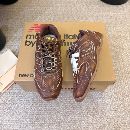 MIUMIU 26S PERFORATED SNEAKERS IN DARK BROWN CALFSKIN