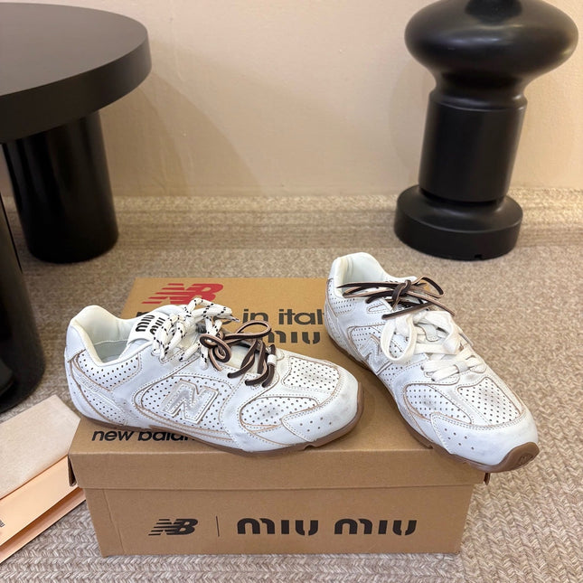 MIUMIU 26S PERFORATED SNEAKERS IN CREAM WHITE CALFSKIN