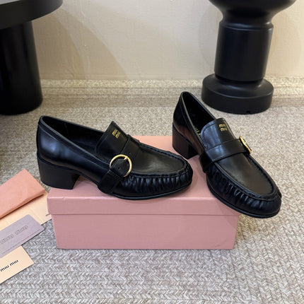 MIUMIU 26S HEEL LOAFERS 50 MM IN BLACK CALFSKIN