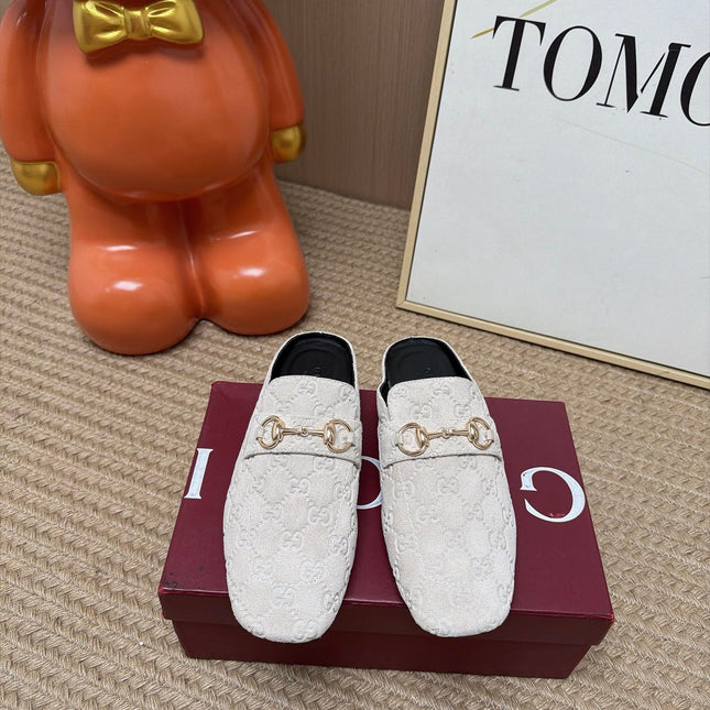 GUCCI 26S FLAT MULES IN OFF WHITE GG EMBOSSED SUEDE