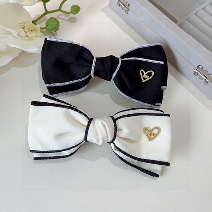 BOW HAIRPIN IN BLACK AND WHITE TRIM COTTON 406022