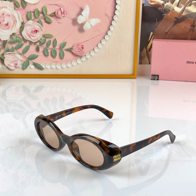 MIUMIU 26S OVAL FRAME IN ACETATE 426527