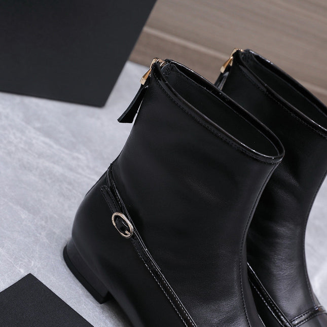 CHANEL 26S ANKLE BOOTS IN BLACK CALFSKIN WITH PATENT LEATHER TRIM AND CC LOGO ON TOE CAP