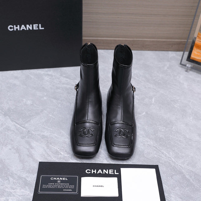 CHANEL 26S ANKLE BOOTS IN BLACK CALFSKIN WITH PATENT LEATHER TRIM AND CC LOGO ON TOE CAP