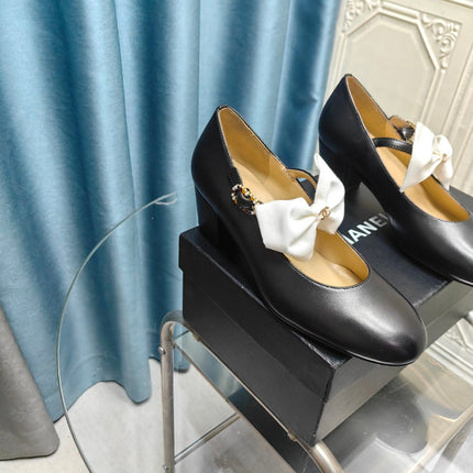 HIGH MARY JANE SHOES BLACK SHEEPSKIN WITH WHITE BOW