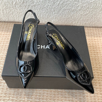 MID-HEEL SLINGBACKS IN BLACK PATENT CALFSKIN