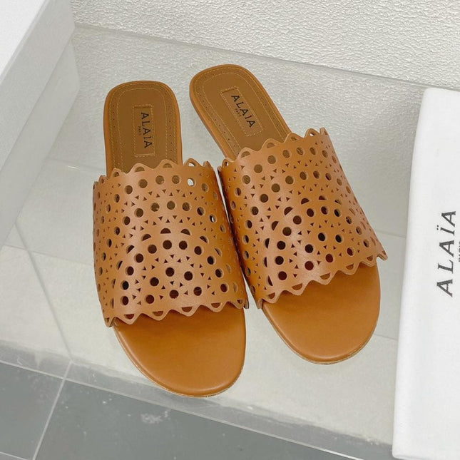ALAIA VIENNE FLAT MULES IN CHOCOLATE BROWN LAMBSKIN