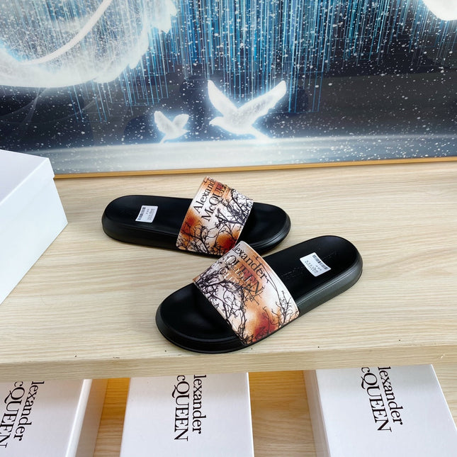 SLIDES SANDAL IN BLACK TPU ORANGE BAND BLACK BRANCH STRAP