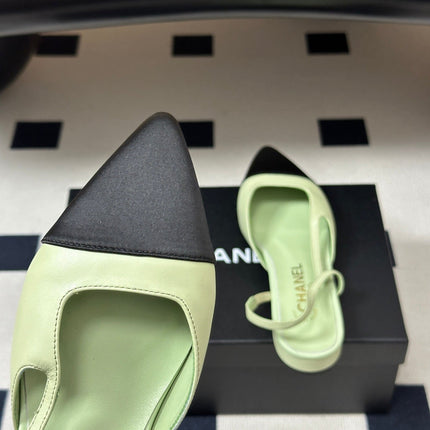 CHANEL 26S POINTED TOE SLINGBACKS IN PASTEL GREEN LAMBSKIN AND BLACK FABRIC