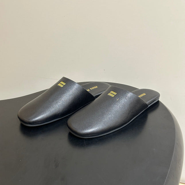 MIUMIU 26S MULE LOAFERS IN BLACK CALSKIN