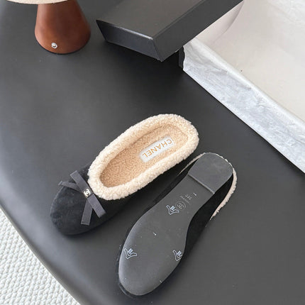 CHANEL 26S MULES IN BLACK SUEDE AND SHEARLING