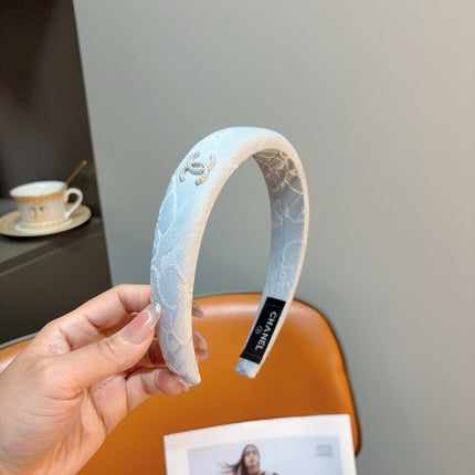 CHANEL 26S HEADBAND IN LIGHT BLUE SILK 505273