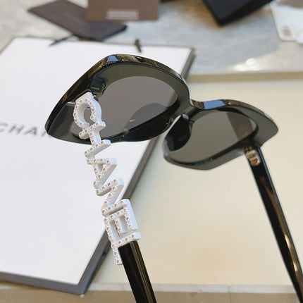 CAT EYE SUNGLASSES IN BLACK ACETATE