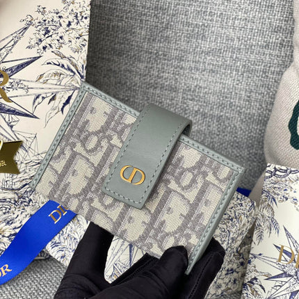 MONTAIGNE WALLET 11 IN OSLO GREY MONOGRAM OBLIQUE JACQUARD