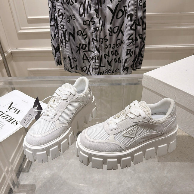 PRADA 26S GEAR SOLE SNEAKERS IN WHITE SUEDE AND MESH
