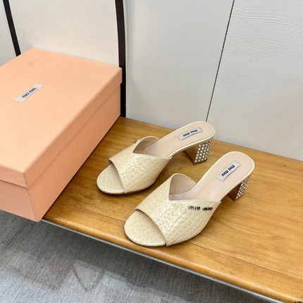JEWELLED HEEL 55 MULE SANDALS IN PALE YELLOW CALFSKIN