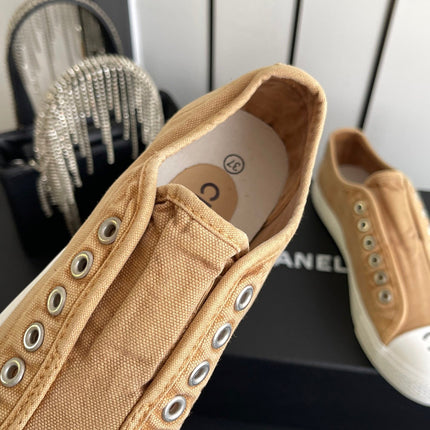 CHANEL 26S LOW TOP BEIGE IN NAVY BLUE CANVAS