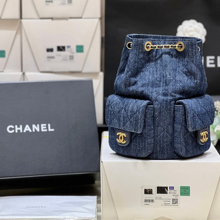 DRAWSTRING BUCKET BACKPACK 24 IN DARK BLUE DENIM GOLD HARDWARE