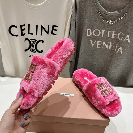 MIUMIU 26S FLAT SLIDES IN PINK SHEARLING