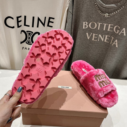 MIUMIU 26S FLAT SLIDES IN PINK SHEARLING
