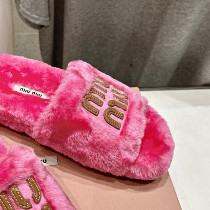 MIUMIU 26S FLAT SLIDES IN PINK SHEARLING