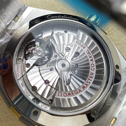 CONSTELLATION 41 MM WATCH SILVER MIX GOLD CASE WITH JUNGLE GREEN DIAL