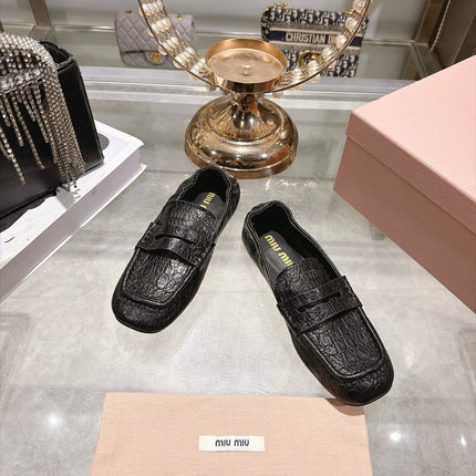 MIUMIU 26S ENNY LOAFERS IN BLACK CROCODILE EMBOSSED CALFSKIN